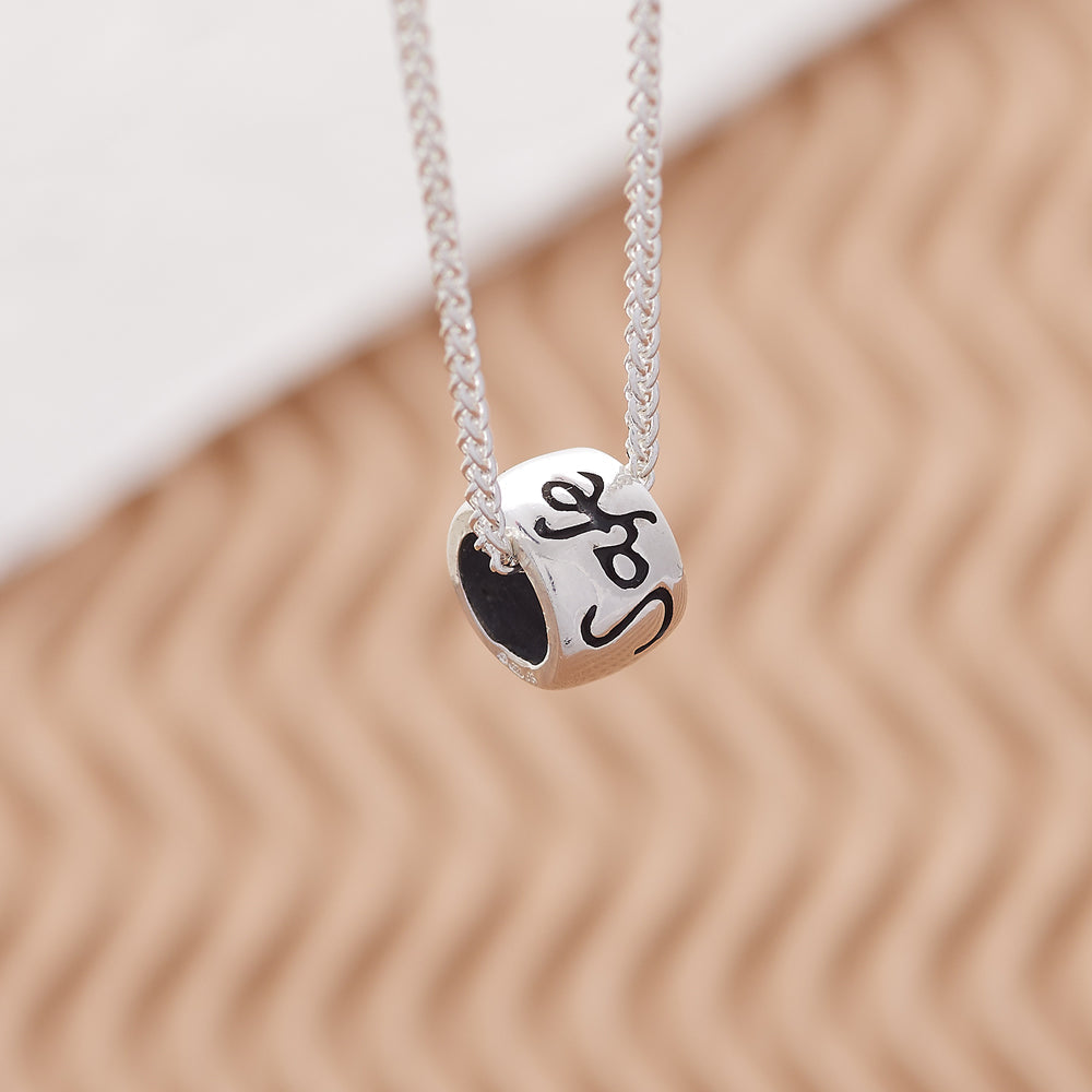 A silver recycled silver necklace with a minimalist design by Scarlett Jewellery
