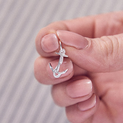 Silver anchor charm with detailed texture, displayed on a white background by Scarlett Jewellery.