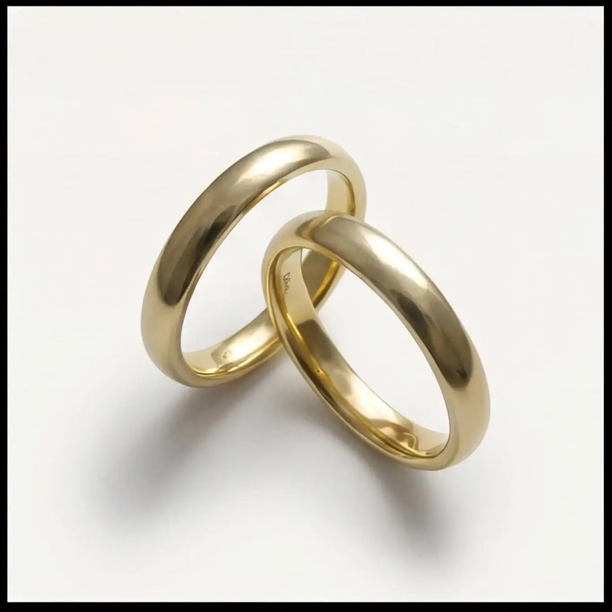 A 3mm gold wedding band featuring a classic lyra design in 9ct, 14ct, or 18ct gold by Majestic Jewellery.