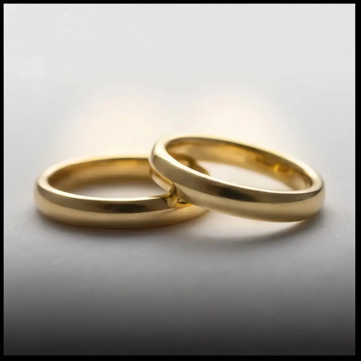 A 3mm gold wedding band featuring a classic lyra design in 9ct gold, displayed on a white background by Majestic Jewellery.