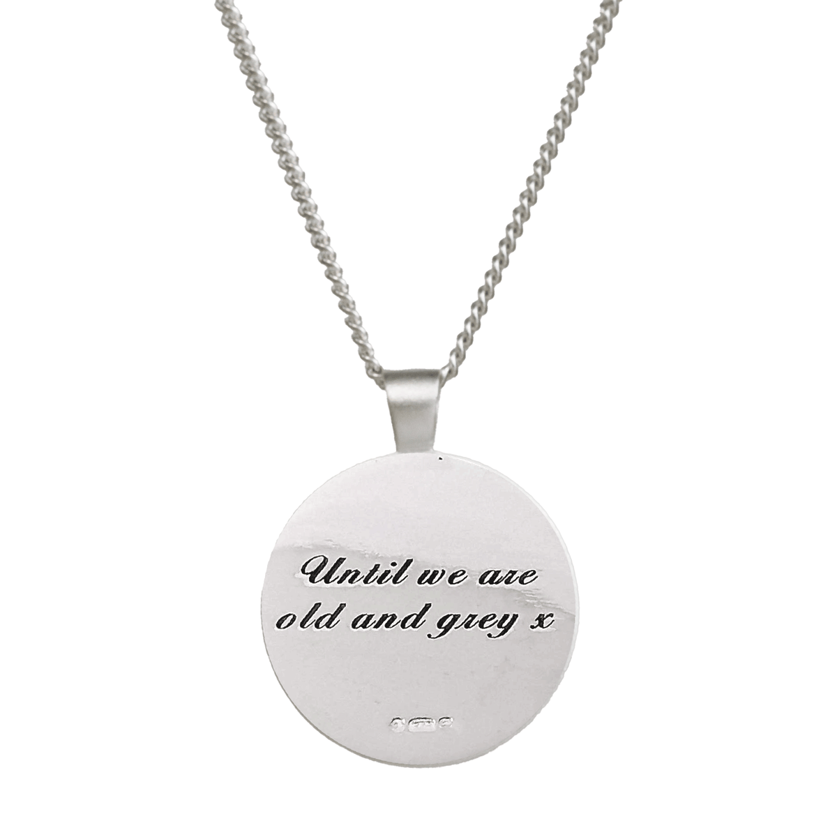 Silver mandala necklace with intricate Aztec design, personalized engraving, and delicate chain by Scarlett Jewellery.