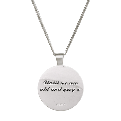 Silver mandala necklace with intricate Aztec design, personalized engraving, and delicate chain by Scarlett Jewellery.