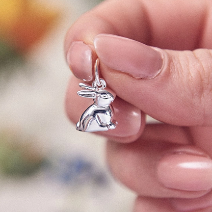 Silver bunny rabbit charm with detailed features, displayed on a soft background, by Scarlett Jewellery.