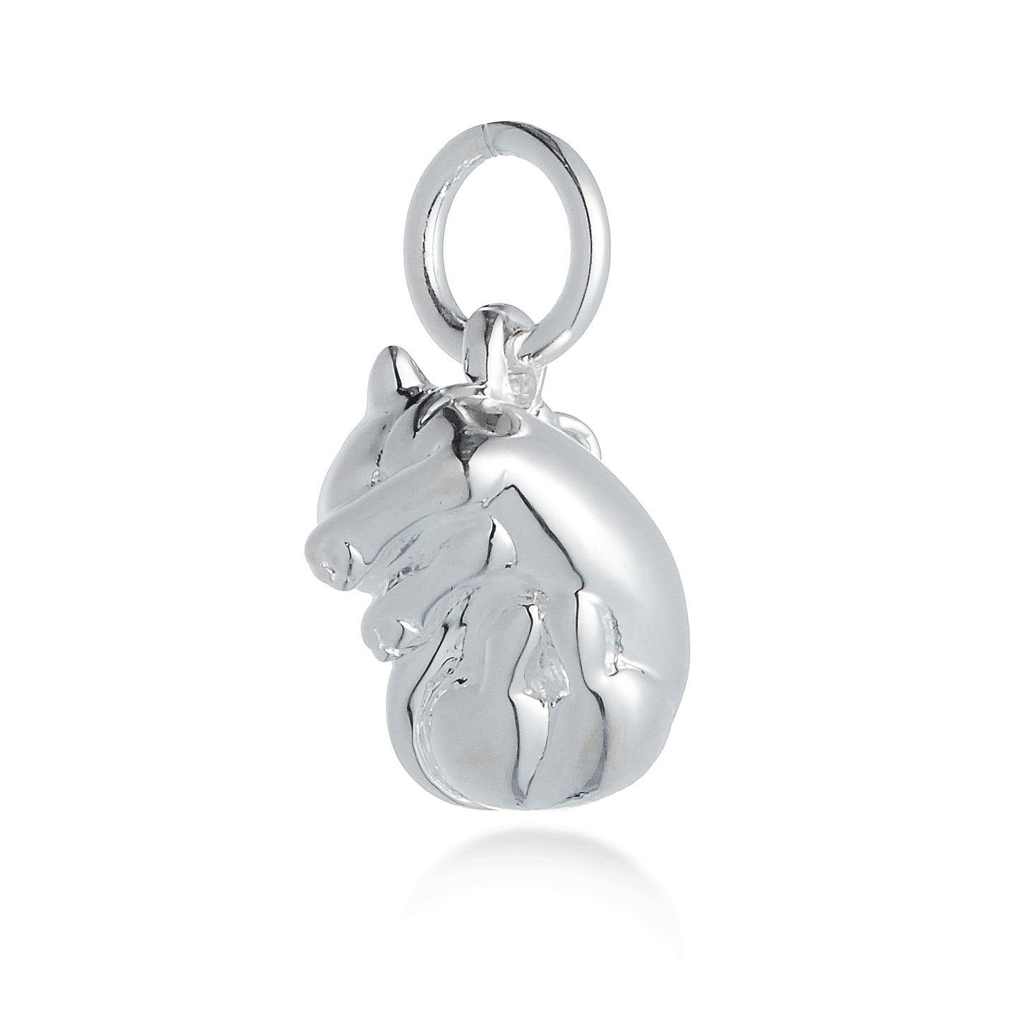 A silver cat charm with intricate detailing, displayed on a soft fabric background, by Scarlett Jewellery.