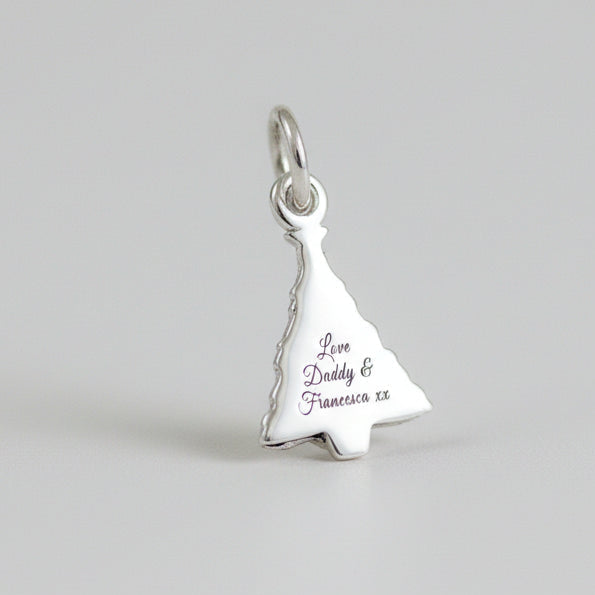 Silver personalised Christmas tree charm with engraved name and date by Scarlett Jewellery.