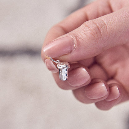 Silver coffee cup charm with delicate detailing, part of the Scarlett Jewellery collection.