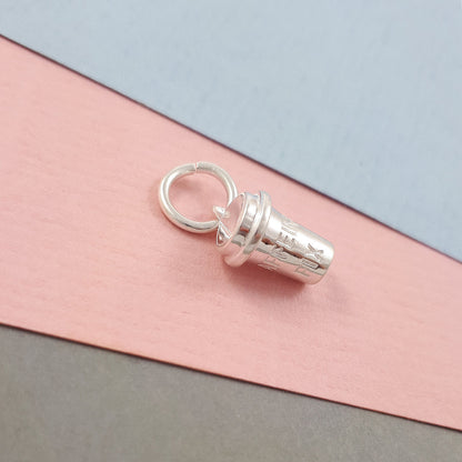 Silver coffee cup charm with intricate detailing, part of the Scarlett Jewellery collection.