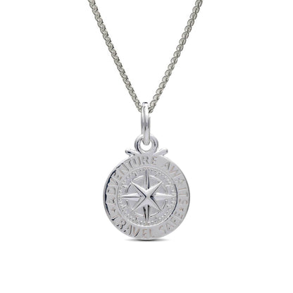 Silver compass charm with personalized engraving, styled on a jewelry display by Scarlett Jewellery.