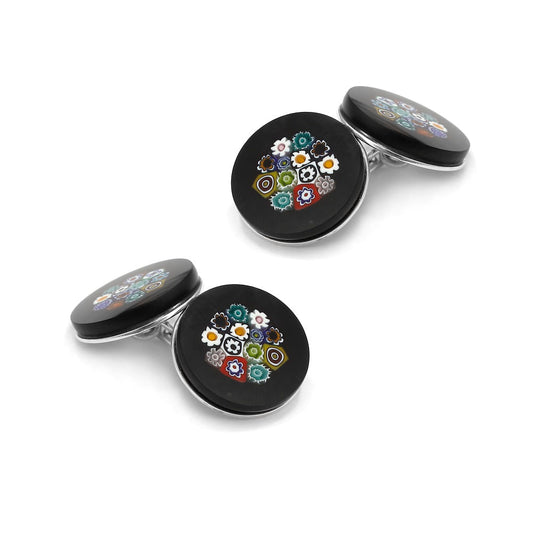Murano glass cufflinks with floral patterns in blue and gold, sterling silver backs, shown close-up.