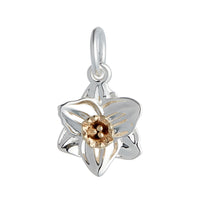 A daffodil flower charm in silver and solid gold, detailed with intricate petal textures, by Scarlett Jewellery.