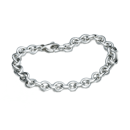 A silver mini lifetime charm bracelet with a delicate chain and personalized charms by Scarlett Jewellery.