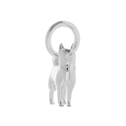A silver pomsky dog charm hangs on a chain, detailed with realistic fur texture and expressive eyes by Scarlett Jewellery.