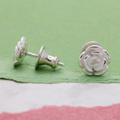 Rose flower silver stud earrings with detailed petal texture by Scarlett Jewellery.