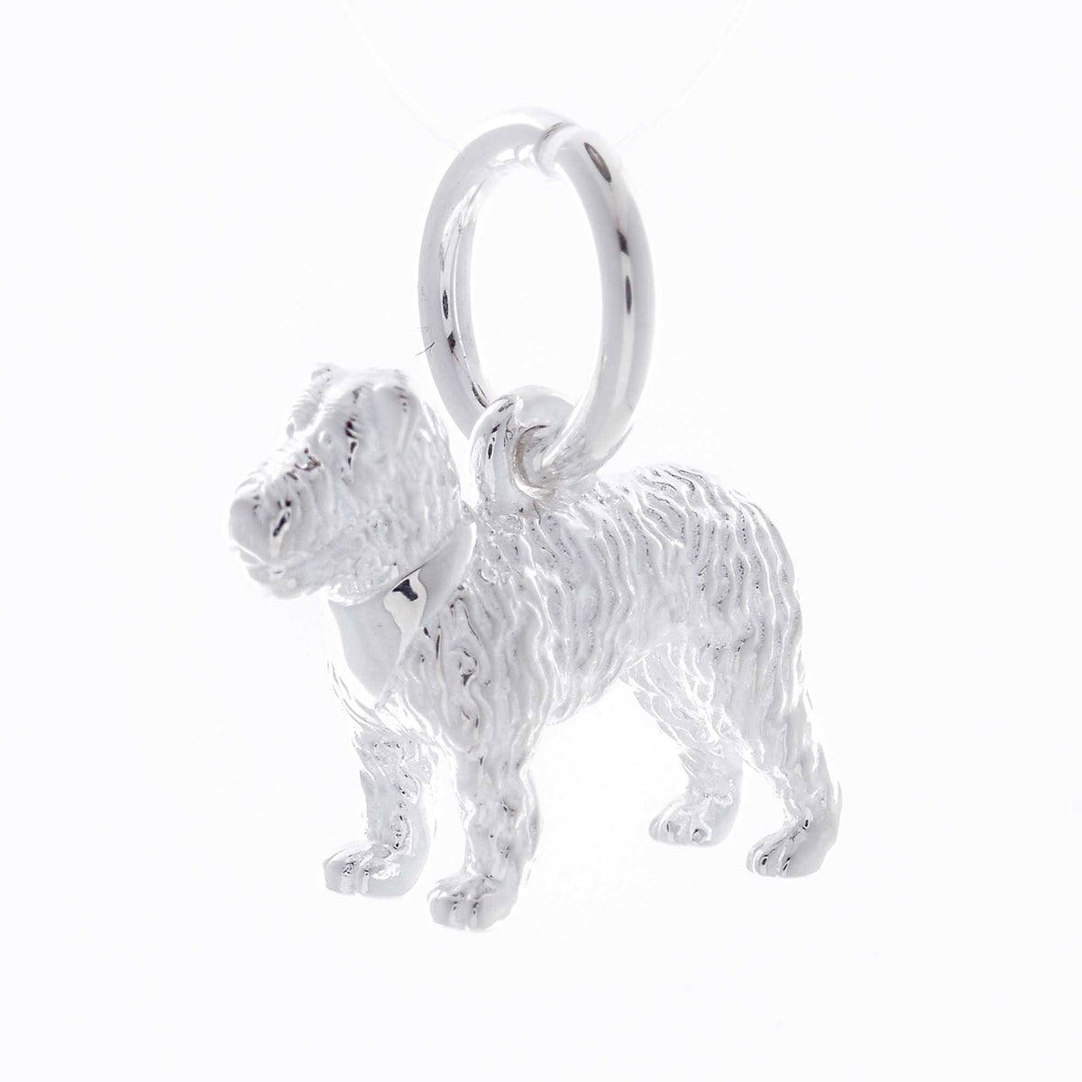 A silver fox terrier dog charm shaped like a paw print, displayed on a white background by Scarlett Jewellery.
