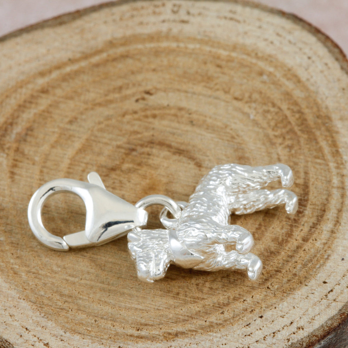 Silver fox terrier dog charm with detailed fur texture by Scarlett Jewellery.