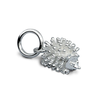 Silver hedgehog charm with intricate detailing, styled on a leather cord, by Scarlett Jewellery.