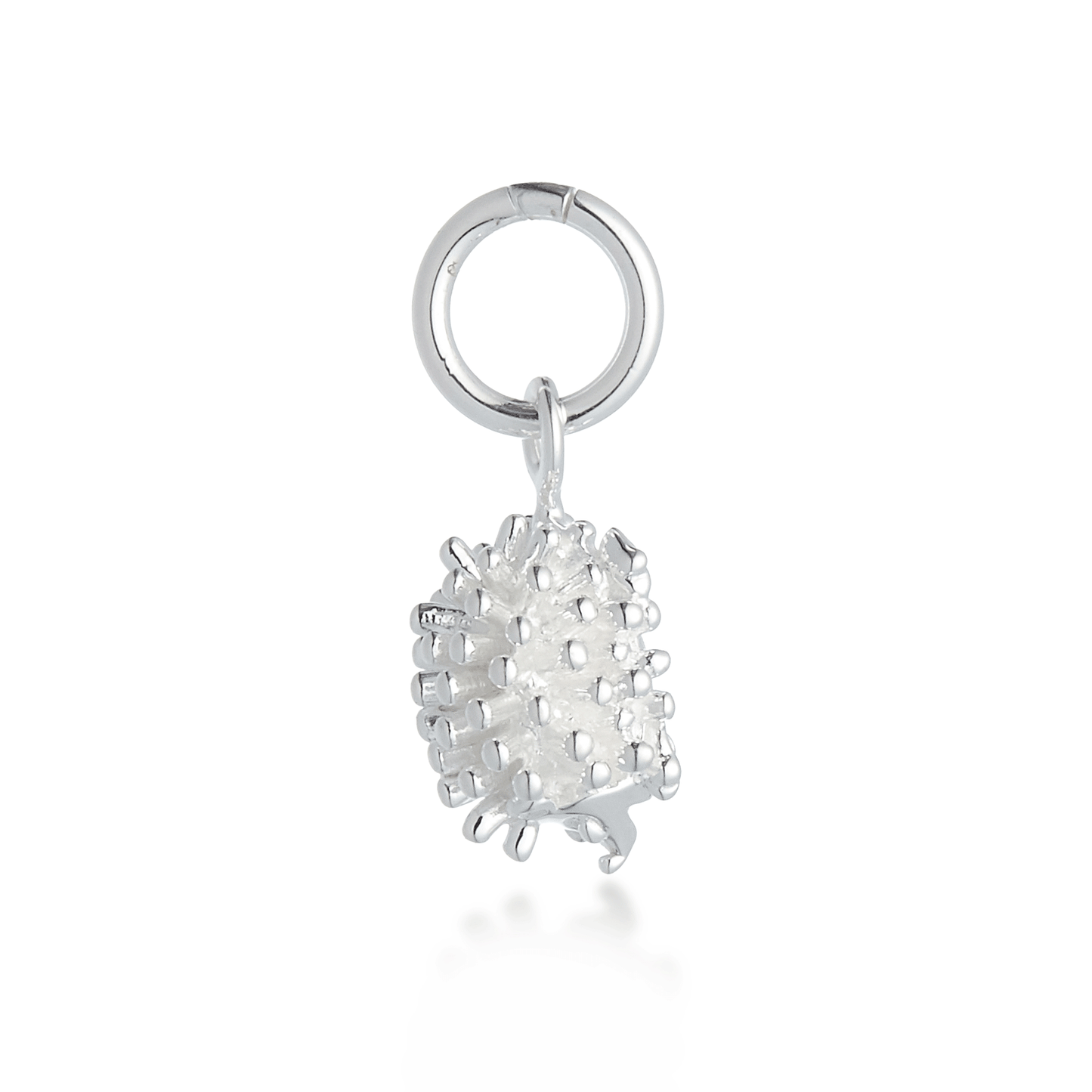 A silver hedgehog charm with detailed texture, displayed on a soft blue background by Scarlett Jewellery.