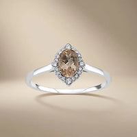 14ct white gold ring with natural morganite and diamond halo by Majestic Jewellery