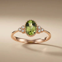 14ct rose gold ring with natural peridot and diamond accent, 0.83ct center stone by Majestic Jewellery.