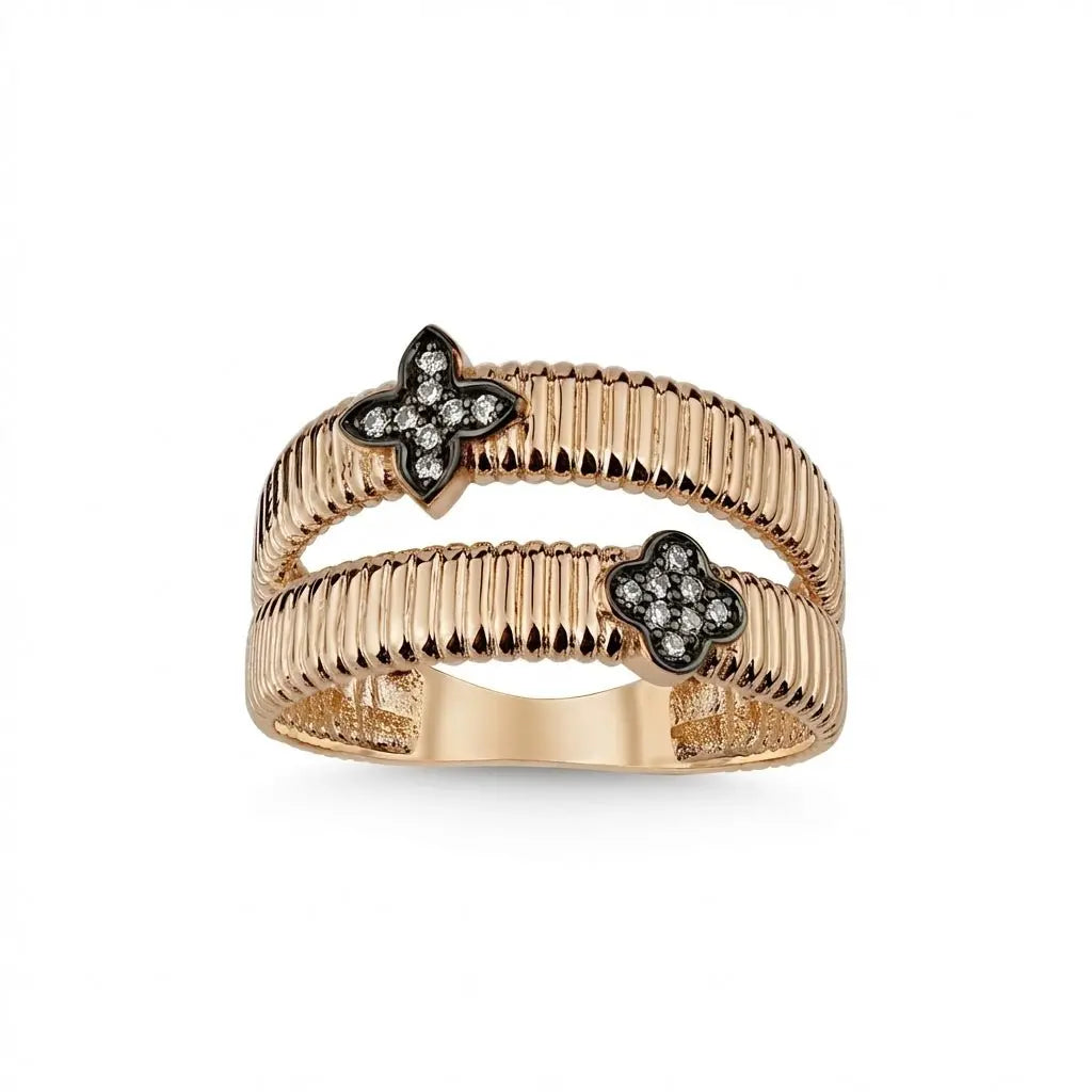 A 14ct rose gold ring featuring two natural diamonds in a double clover design by Majestic Jewellery.