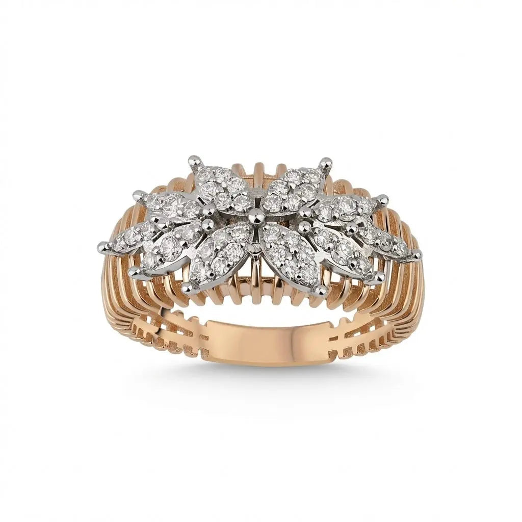 A 14ct gold floral cluster diamond ring with natural diamonds set in a delicate design by Majestic Jewellery.