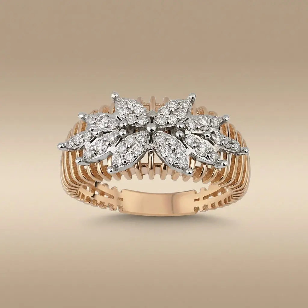 A 14ct gold floral cluster diamond ring with natural diamonds set in a delicate design by Majestic Jewellery.
