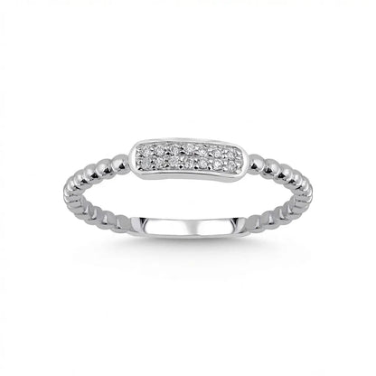 A minimalist 14ct white gold ring featuring a natural diamond bar, set against a soft background by Majestic Jewellery.