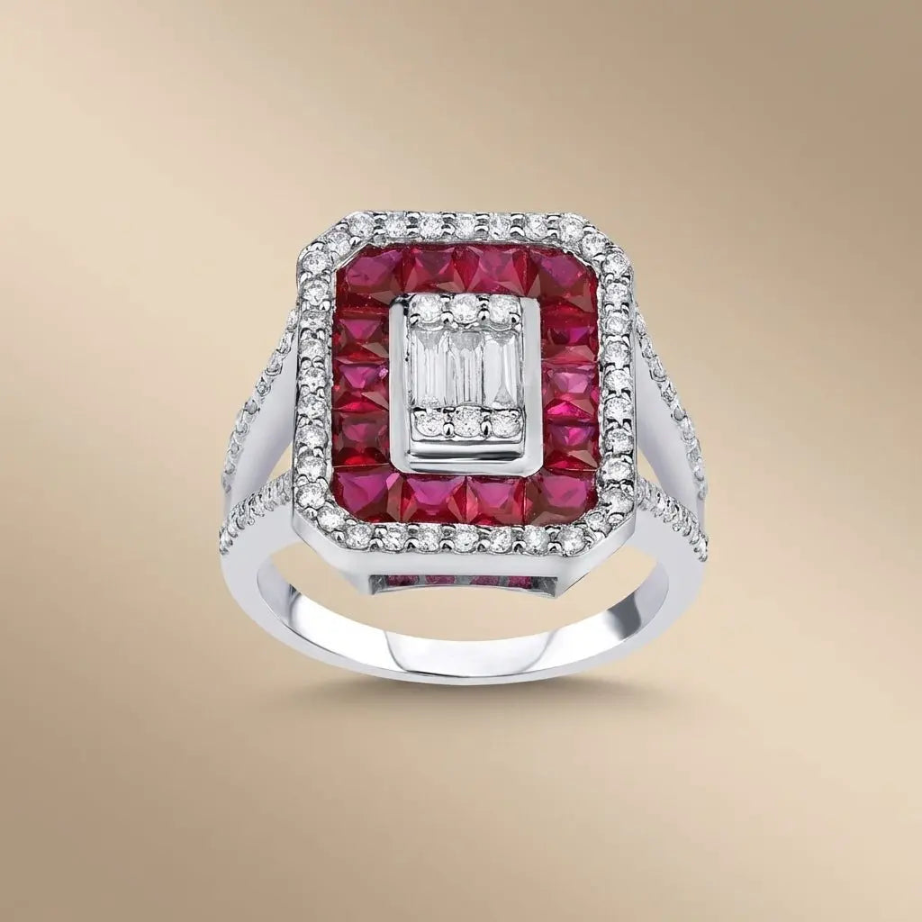 14ct white gold ruby and diamond halo ring with a center ruby and sparkling diamonds by Majestic Jewellery.