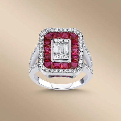 14ct white gold ruby and diamond halo ring with a center ruby and sparkling diamonds by Majestic Jewellery.