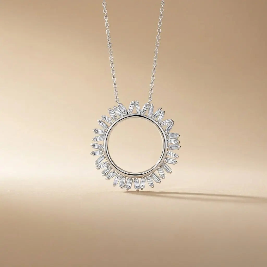 14ct white gold pendant with circular baguette diamond sunburst 0.45ct worn on a chain by Majestic Jewellery