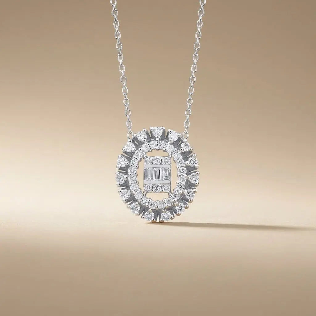 14ct white gold oval halo diamond pendant with baguette center 0.37ct by Majestic Jewellery