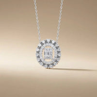 14ct white gold oval halo diamond pendant with baguette center 0.37ct by Majestic Jewellery
