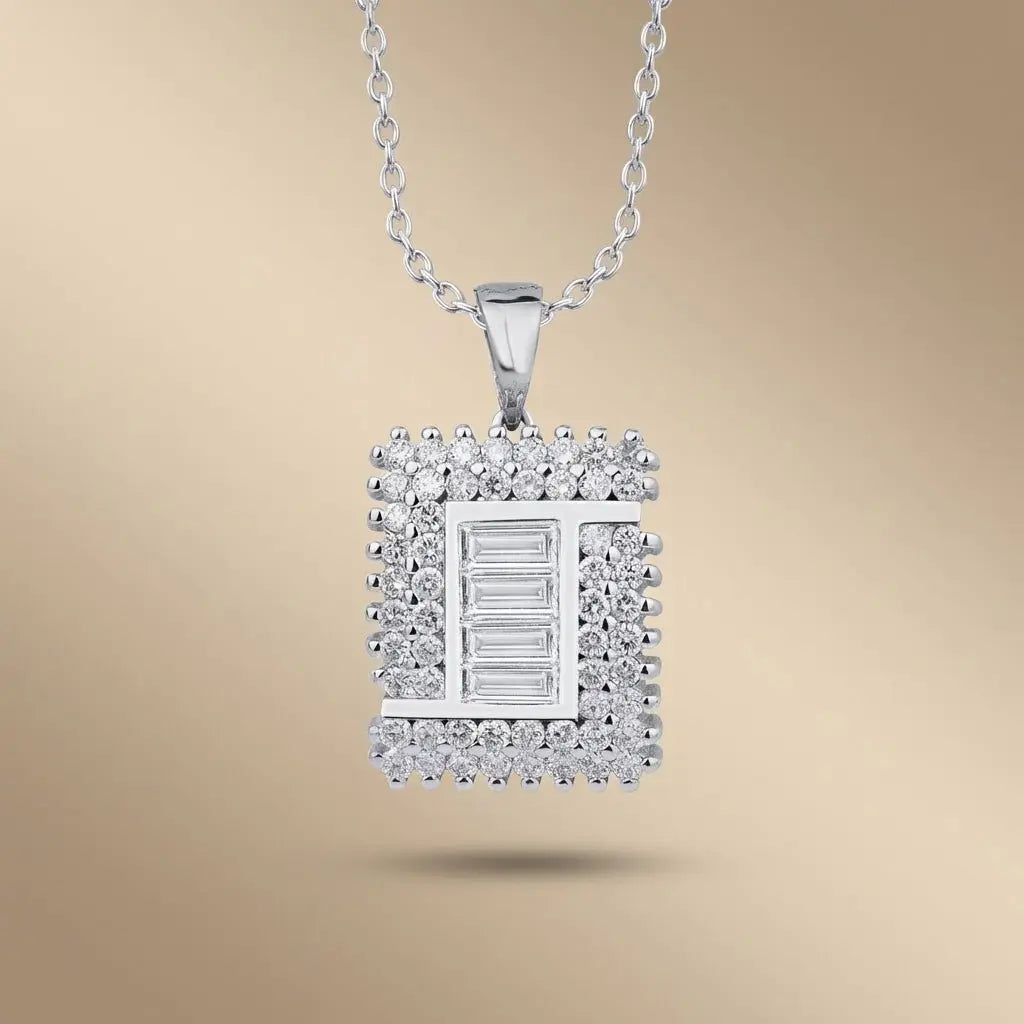 14ct white gold diamond pendant with a square baguette center diamond 1.03ct by Majestic Jewellery