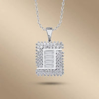 14ct white gold diamond pendant with a square baguette center diamond 1.03ct by Majestic Jewellery