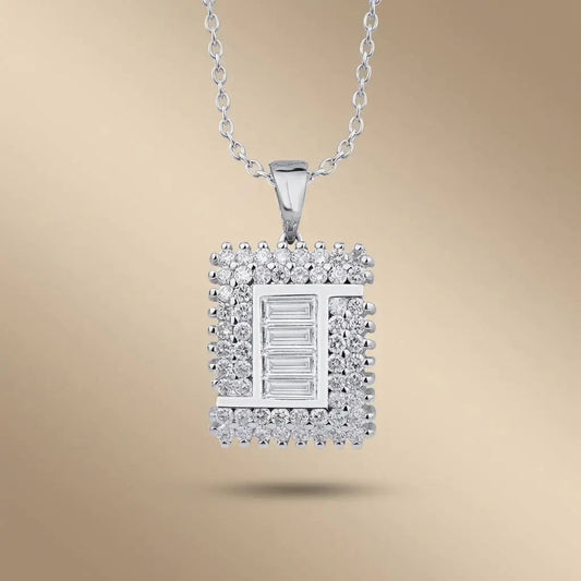 14ct white gold diamond pendant with a square baguette center diamond 1.03ct by Majestic Jewellery