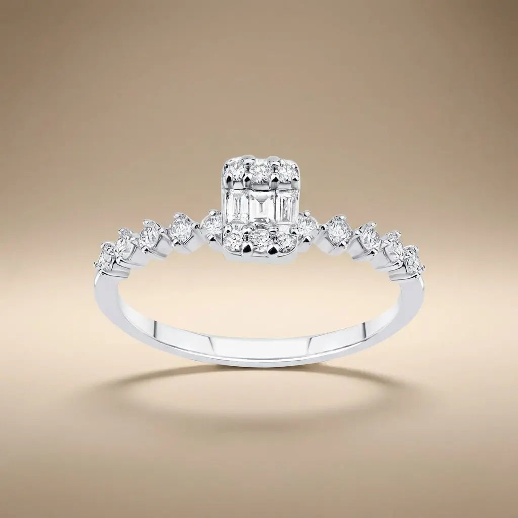 14ct white gold ring with baguette diamond cluster and 0.34ct accents worn on a finger by Majestic Jewellery