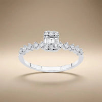 14ct white gold ring with baguette diamond cluster and 0.34ct accents worn on a finger by Majestic Jewellery