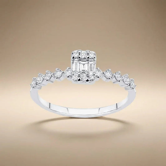 14ct white gold ring with baguette diamond cluster and 0.34ct accents worn on a finger by Majestic Jewellery
