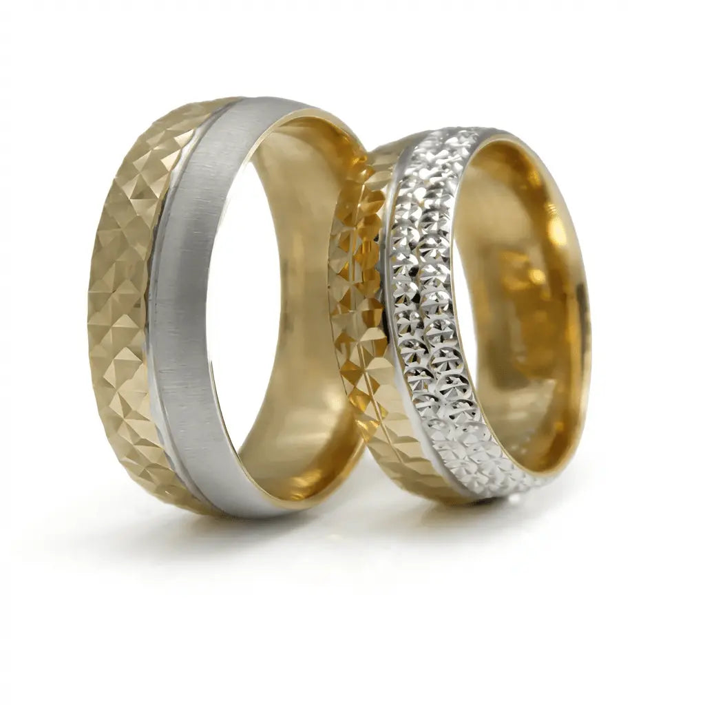 A two-tone 7mm gold wedding band with faceted details in 9ct, 14ct, and 18ct gold by Majestic Jewellery.