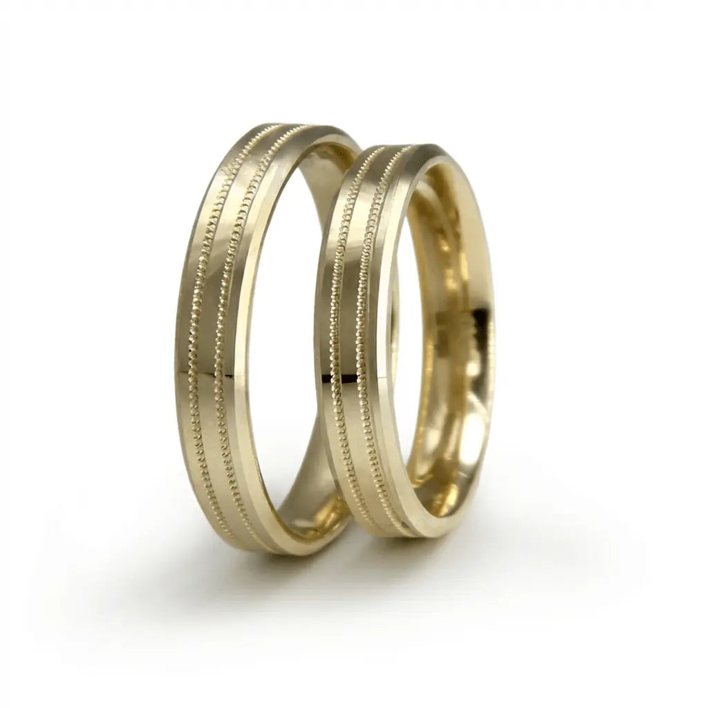 A 4mm gold wedding band with double line design in 9ct gold, shown flat on a white background by Majestic Jewellery.