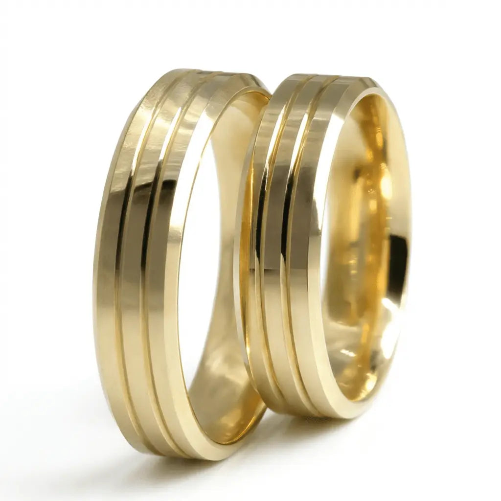 A 5mm gold wedding band with triple line design in 9ct gold, shown against a black background by Majestic Jewellery.