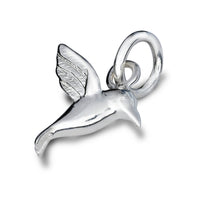 Silver hummingbird charm with delicate wings, displayed on a soft white background, part of the Scarlett Jewellery collection