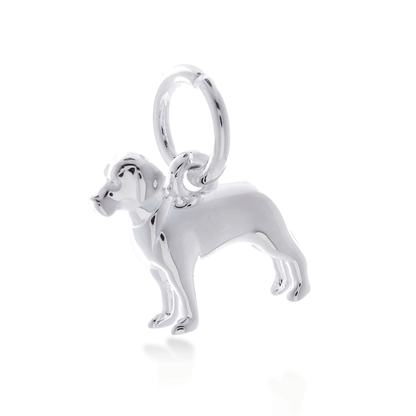 A silver Labrador dog charm shaped like a loyal companion, displayed on a soft blue background, by Scarlett Jewellery.