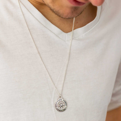 Large silver necklace featuring an outline compass and St Christopher icon by Scarlett Jewellery.