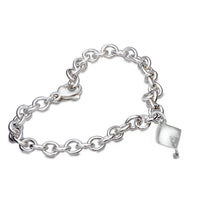 Silver charm bracelet with personalized mortar board charm by Scarlett Jewellery