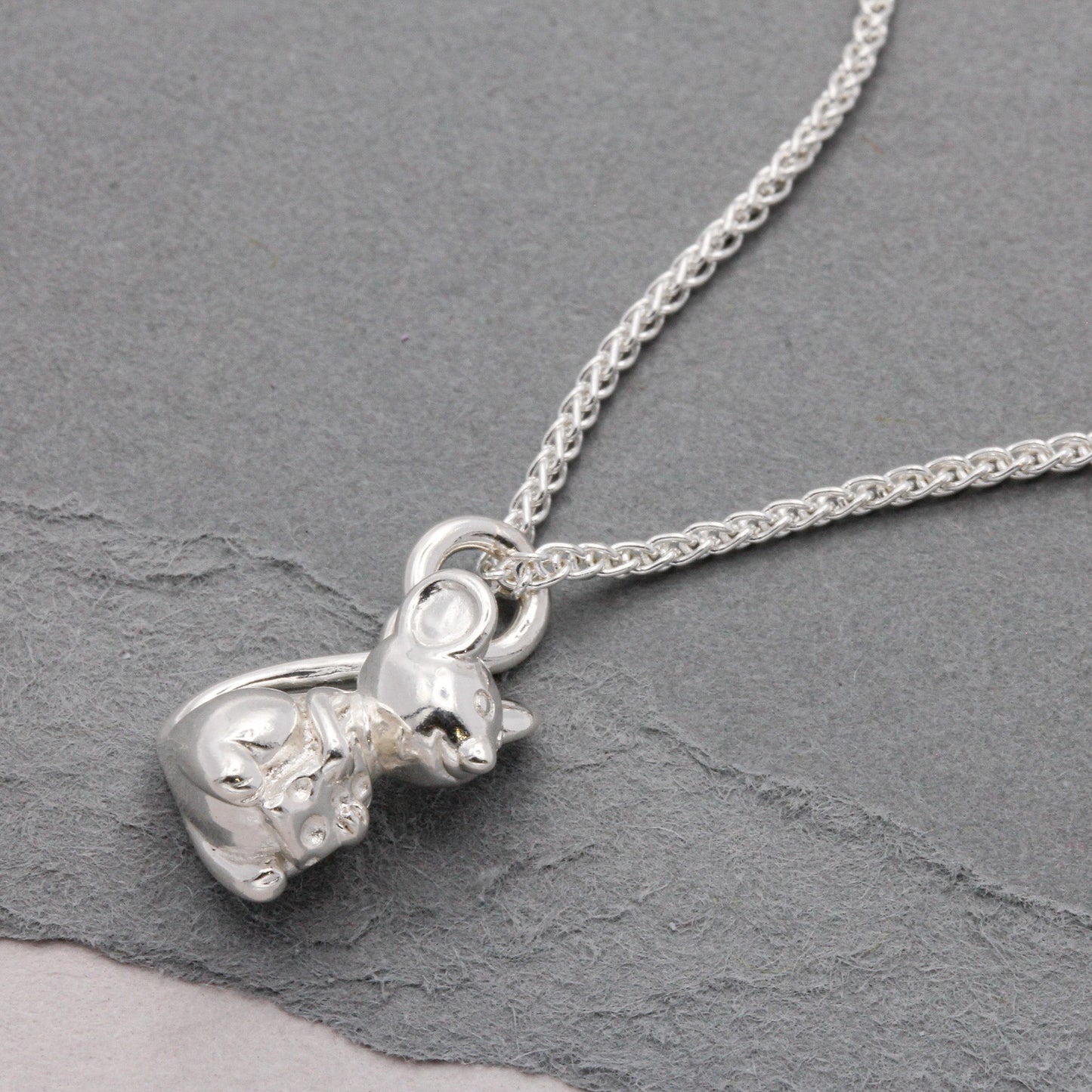 Silver mouse charm with detailed texture and intricate design by Scarlett Jewellery.