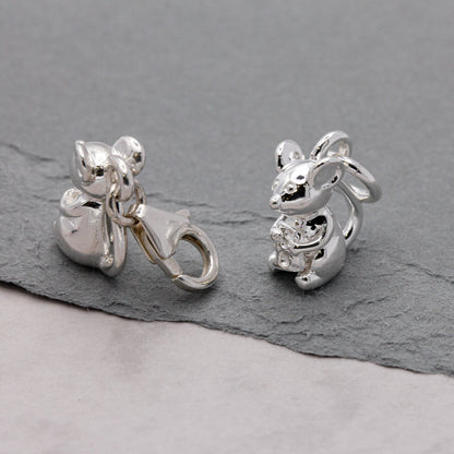 Silver mouse charm with detailed texture, displayed on a soft background, by Scarlett Jewellery.
