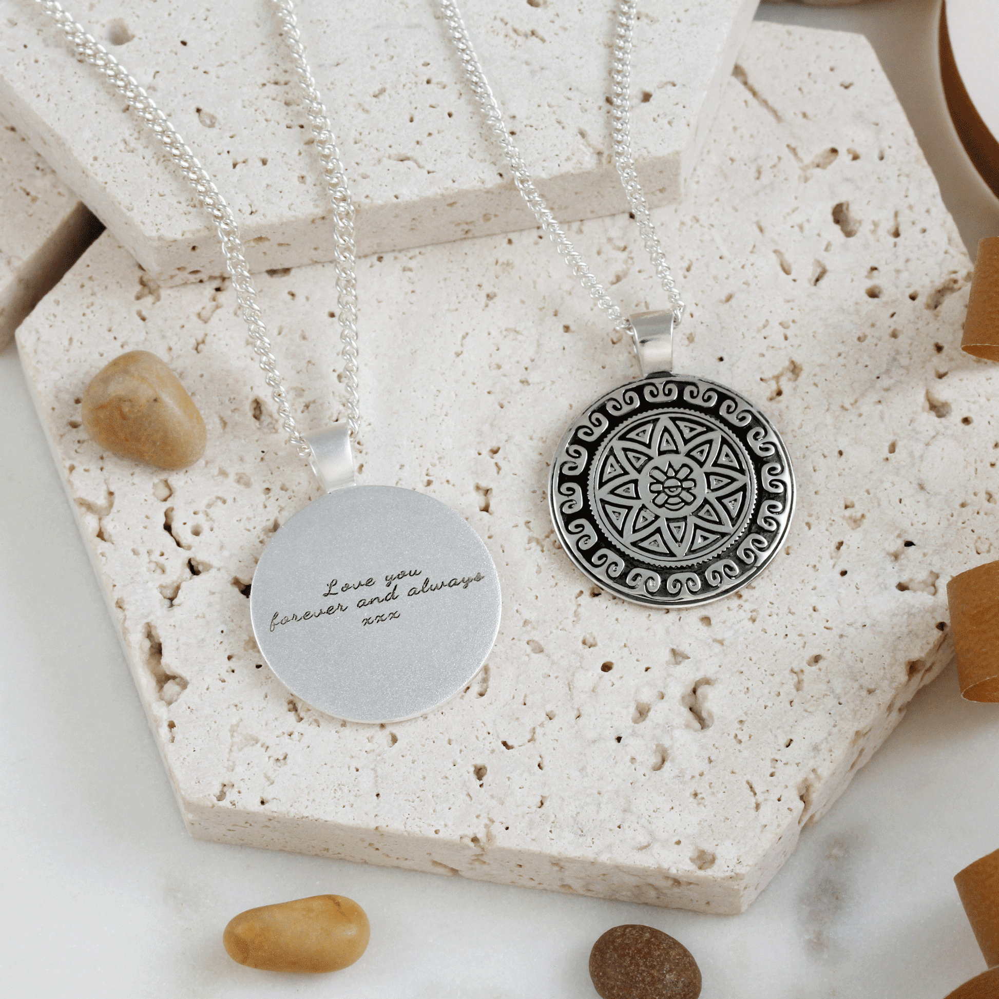 Silver mandala necklace with intricate Aztec design, personalized engraving, and delicate chain by Scarlett Jewellery.