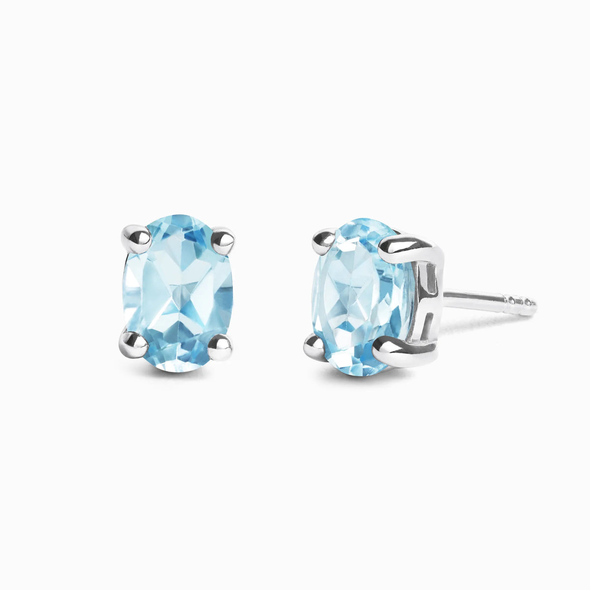 Blue Topaz Oval Stud Earrings in Sterling Silver - SJR London Timepiece