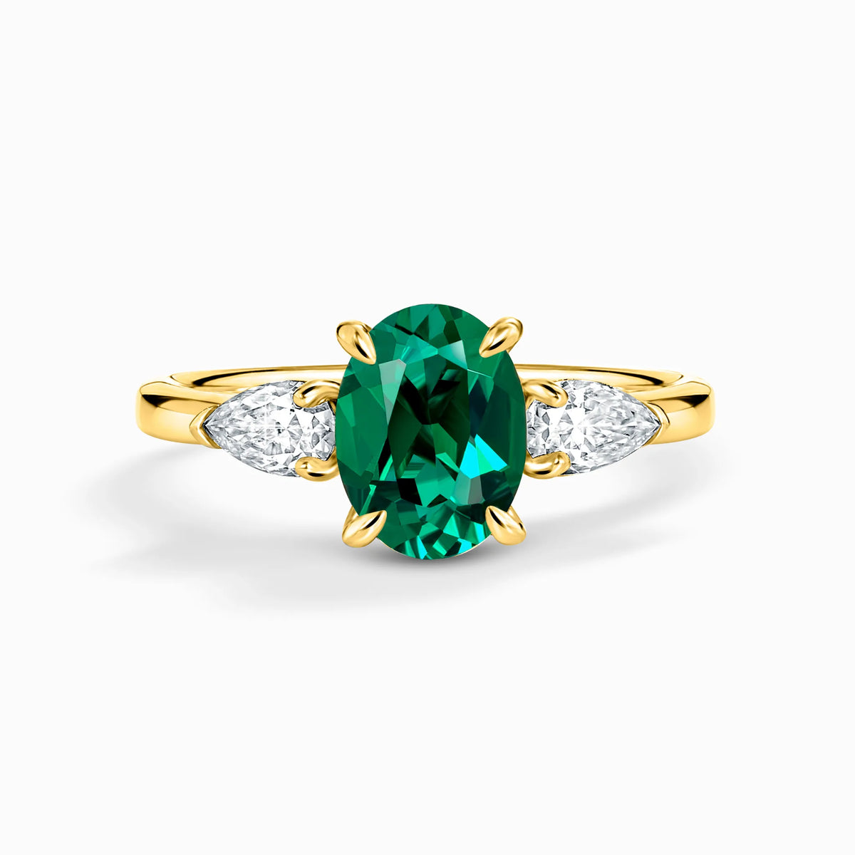 Emerald Oval Cut Three Stone Engagement Ring in 18k Gold Vermeil - SJR London Timepiece